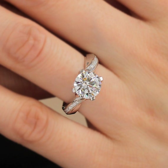 Platinum plated cz elevated pattern ring with 8mm solitaire -