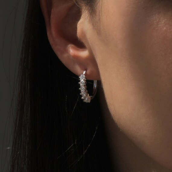 Platinum diamond huggie earrings deals
