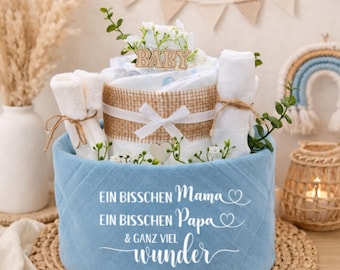 Diaper cake-boy-blue|A little bit of mommy, a little bit of daddy and a whole lot of wonder|27 diapers, muslin cloth, socks, burp cloth, wooden sticks, flowers