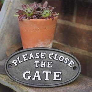 Cast Iron Close the gate sign