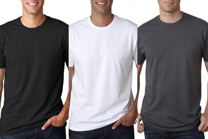 May include: Three plain t-shirts in black, white and grey. The shirts are crew neck and short-sleeved.