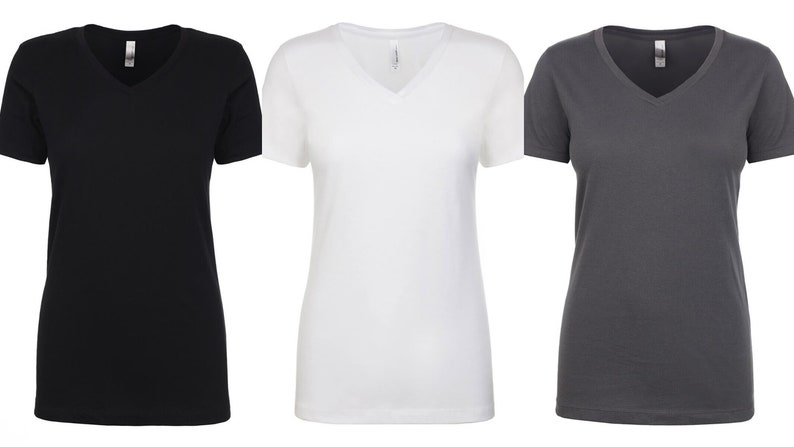 May include: Three V-neck t-shirts in black, white, and gray.