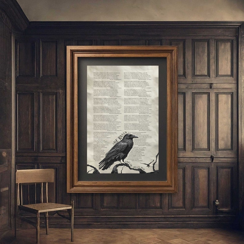 A large framed Raven poem print by Edgar Allan Poe hangs wall on a wooden Victorian style wall next to a simple wood chair.