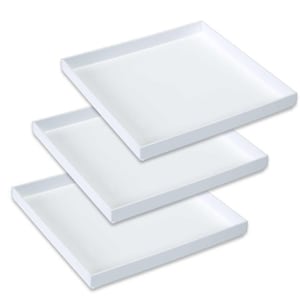 May include: Three white square trays stacked on top of each other. The trays are made of a smooth, white material and have a slightly raised edge.