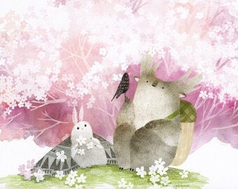 May include: A watercolor painting of a pink and white cherry blossom tree with a small rabbit and a larger animal with a bird perched on its head. The animals are standing on a green patch of grass with white flowers. The painting is framed in a light wood frame. #tukonitribe