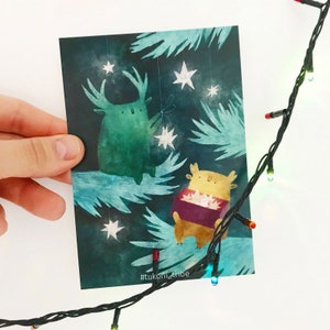 Tukoni accroche la carte postale des étoiles, carte de Noël, impression de carte postale mignonne, illustration de carte postale, carte de voeux