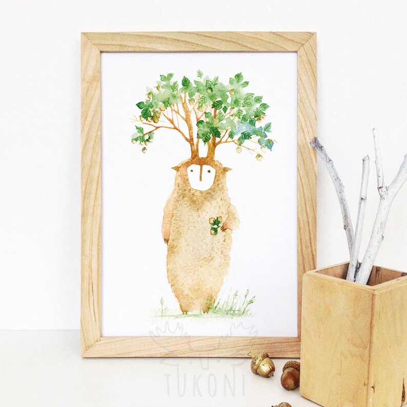May include: A watercolor illustration of a brown bear with a tree growing out of its head. The bear is holding a small bunch of green leaves in its paw. The illustration is framed in a light wood frame.
