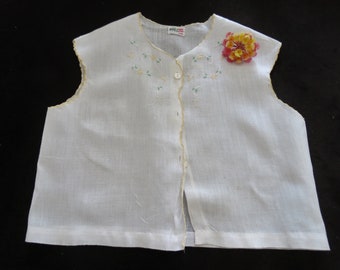 Precious vintage white 9-12 months diaper top/shirt with hand embroidered flowers.  Perfect diaper shirt for picnics, and photos..