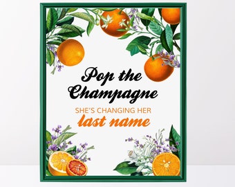 Pop the champagne she's changing her last name Lavender citrus bridal shower decor She found her main squeeze Oranges Bridal shower sign