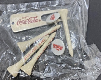 Enjoy Coca Cola 4 Golf Tee Set w 2 Ball Markers and 1 Divot Tool 1980s Vintage