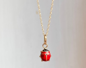14mm x 18mm Solid 14k Yellow Gold Enameled Ladybug in Heart Pendant Charm 14mm x 18mm Solid 14k Yellow Gold Enameled Ladybug in Heart Pendant Charm