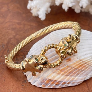 Brazalete vintage de cuerda acanalada con cabeza de pantera doble y ojo de esmeralda en oro amarillo de 14 kt