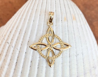 May include: A gold pendant featuring a Celtic knot design with a circular border. The pendant is a traditional symbol of love, friendship, and unity.