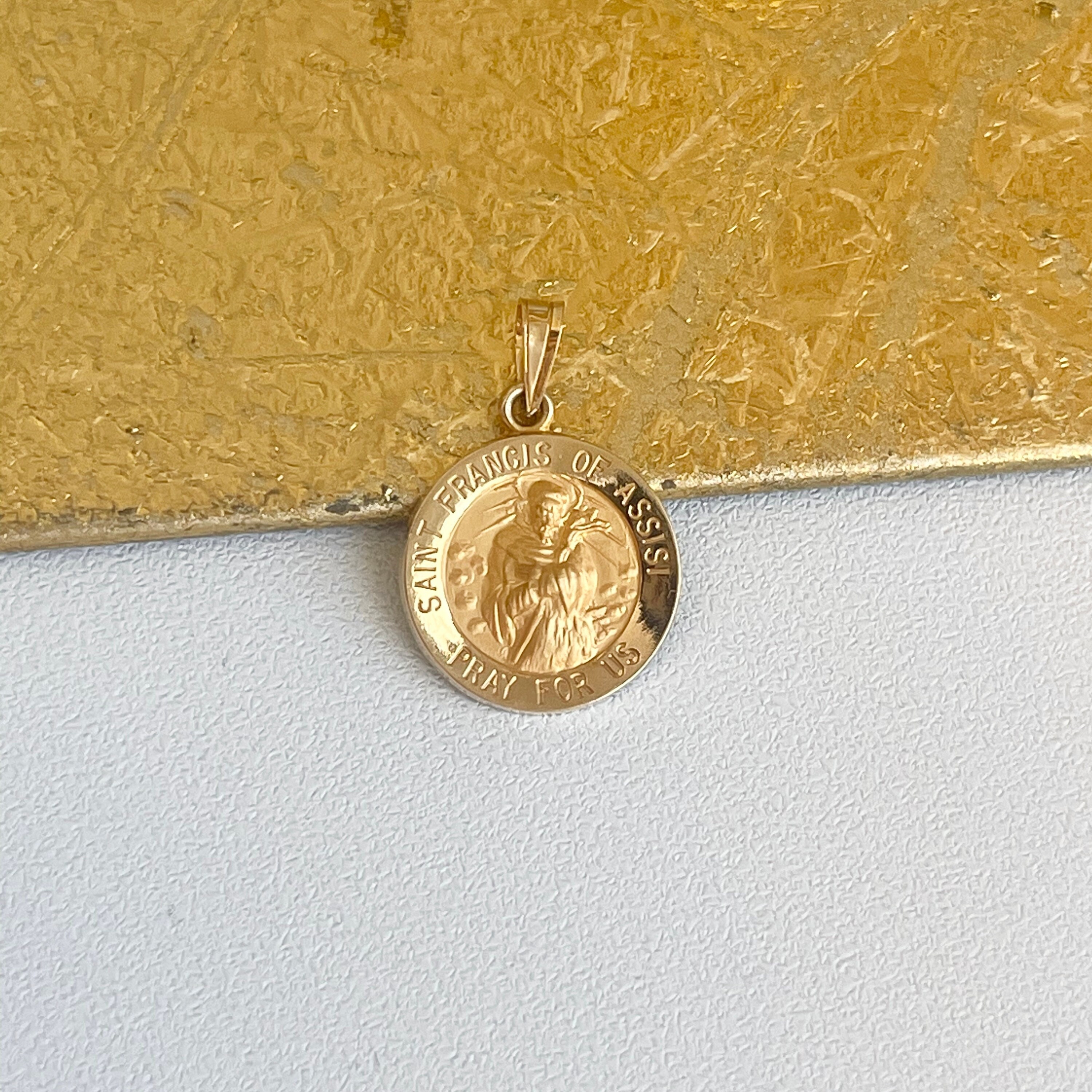 St francis gold pendant deals