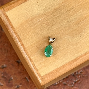 14KT Yellow Gold Oval Emerald and Round Diamond Light Weight Pendant