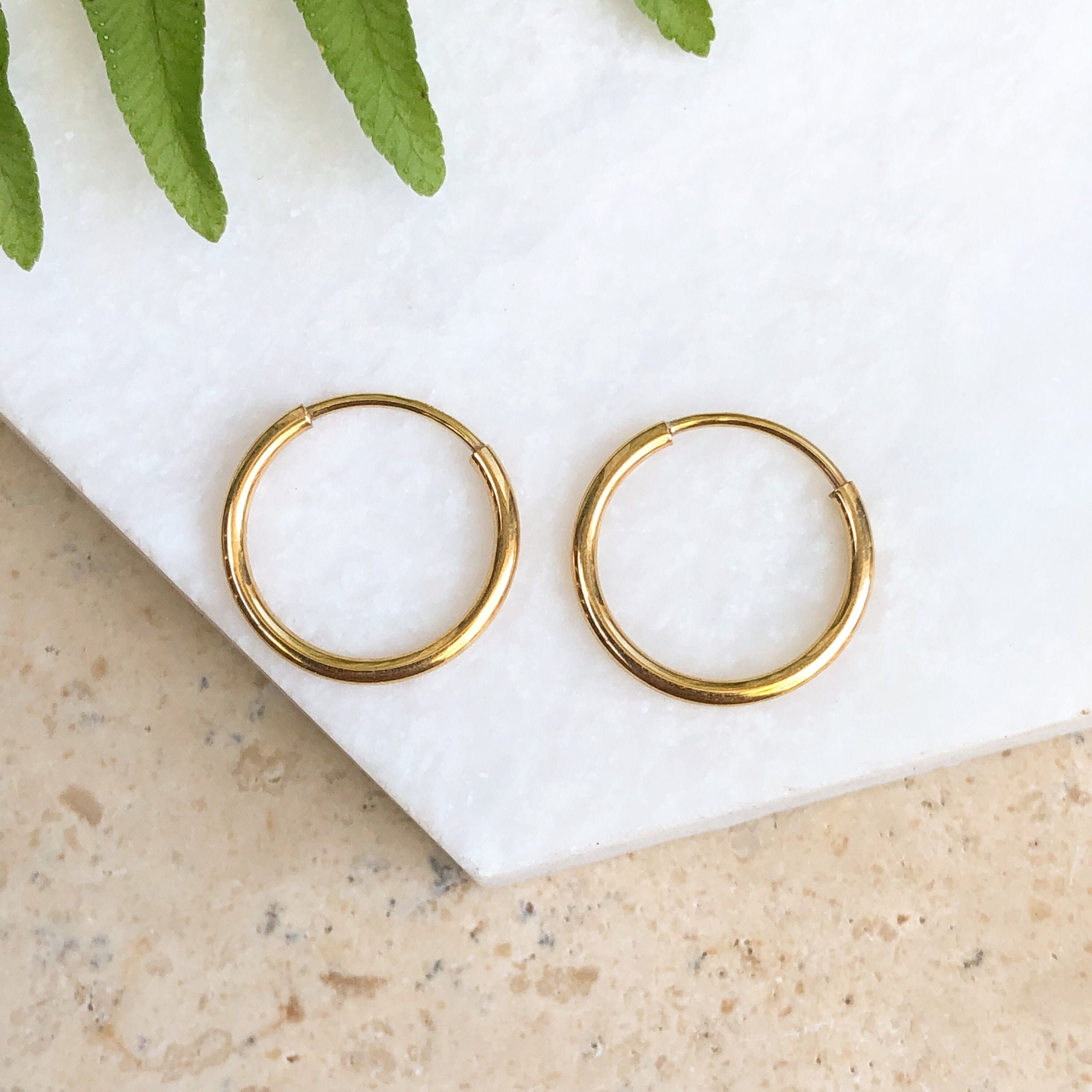 Small gold endless on sale hoop earrings