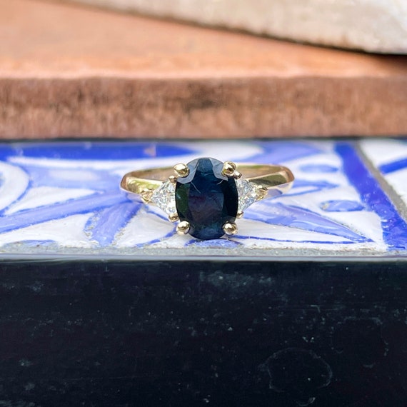 14k White Gold .90 Trillion Cut Tanzanite & Diamond Pendant 14k White Gold .90 Trillion Cut Tanzanite & Diamond Pendant