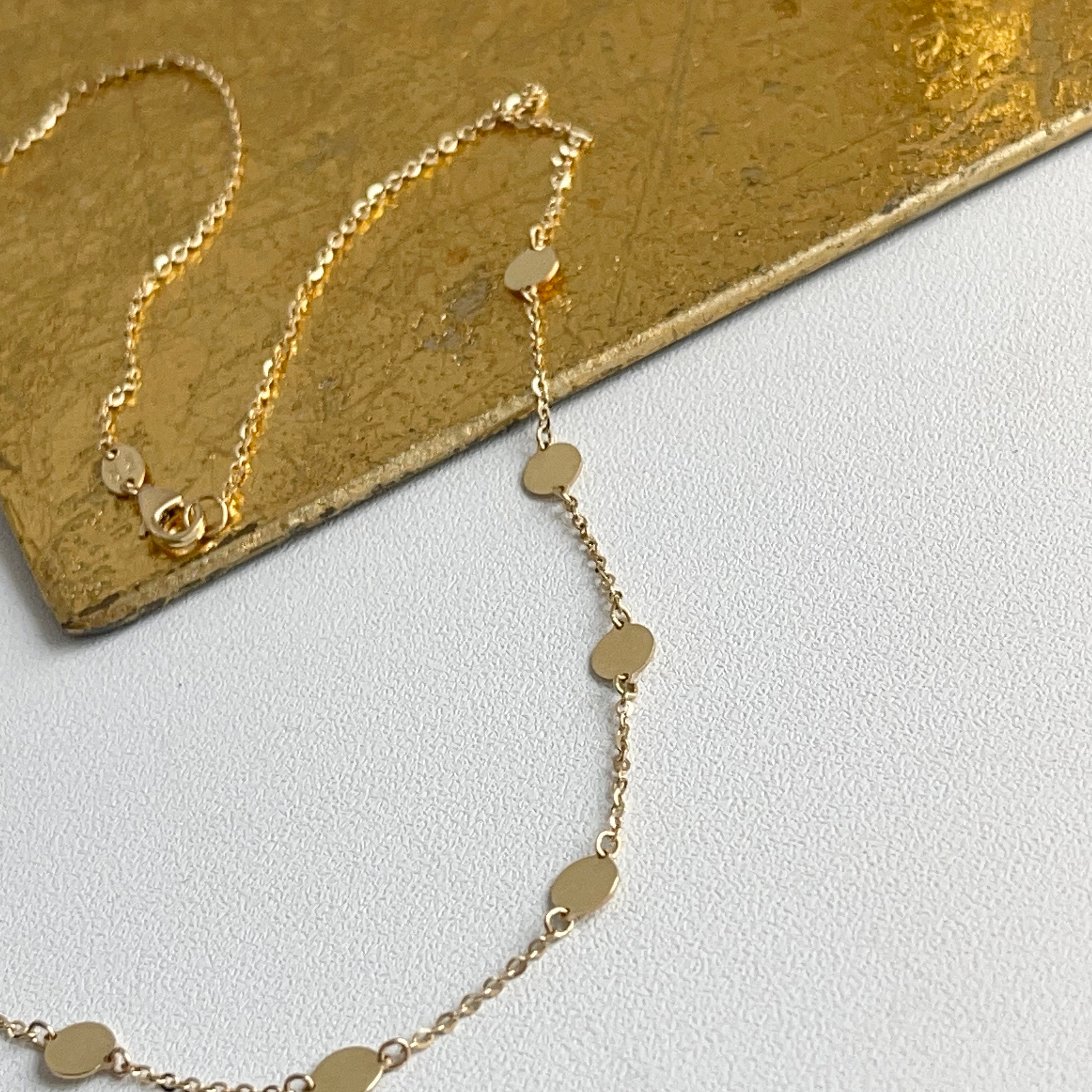 Gold disc station best sale necklace