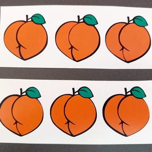 May include: Six peach-shaped stickers with green leaves. The peaches are orange and have a slight blush on one side.