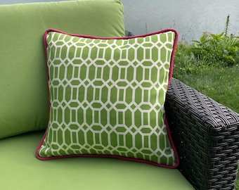 Kelly green with white hexagon indoor outdoor pillow cover with hot pink Sunbrella piping