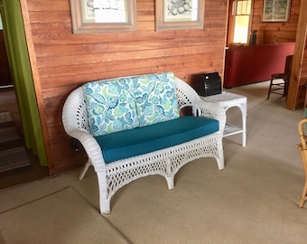 New Sunbrella cover for existing wicker loveseat cushion.