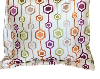 Cream colored with vibrant embroidered hexagons pillow cover