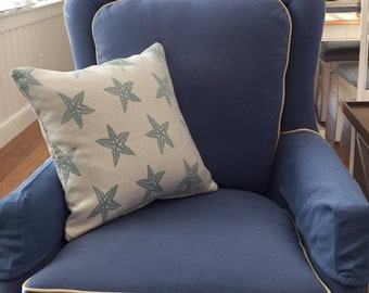 Outdoor treated fabric in a pale blue starfish design