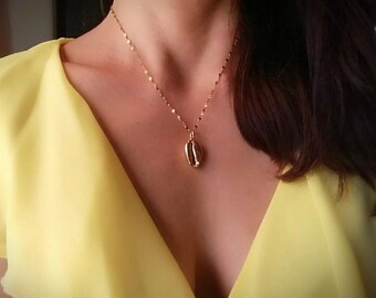 Gold cowrie shell necklace. Gold dipped cowrie shell necklace. Layering necklace. 24K gold plated cowrie shell necklace.