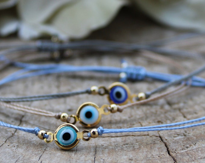Evil eye cord bracelet. String bracelet. Protection bracelet. Adjustable bracelet.
