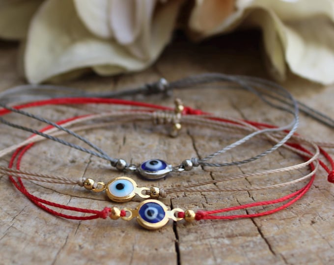 Evil eye cord bracelet. String bracelet. Protection bracelet. Adjustable bracelet.