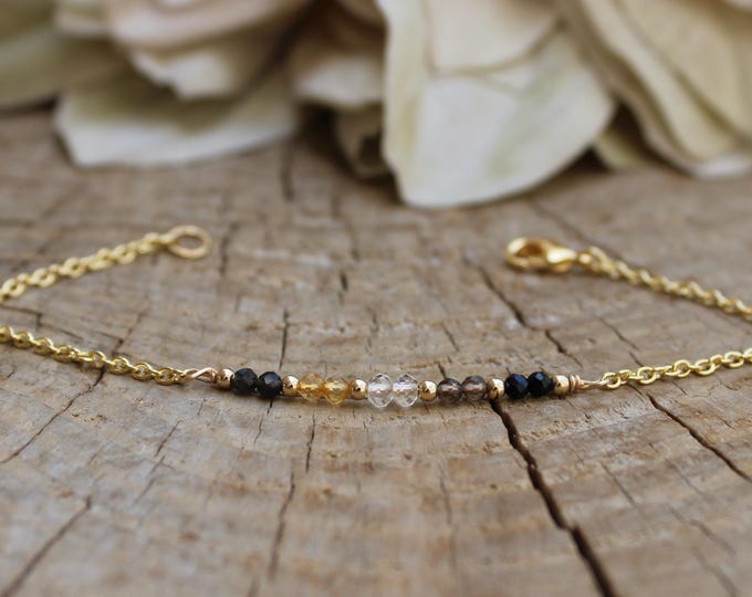 Empath protection and grounding bracelet. Black tourmaline, smoky quartz, clear quartz, citrine,  black sheen obsidian.