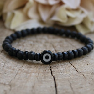 Mens evil eye bracelet. Beaded evil eye bracelet. Lava rock bracelet. Stone bracelet. Gift for him. Mens stretch bracelet. Protection