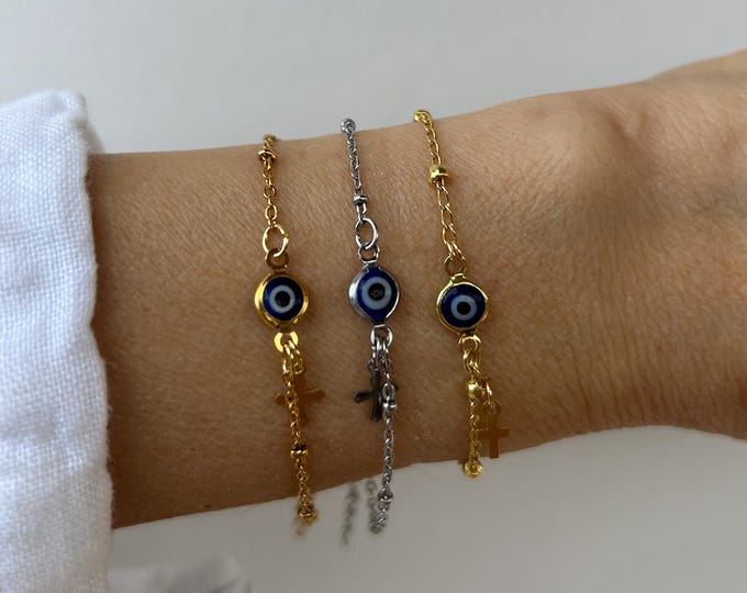 Evil eye and cross bracelet .Blue evil eye mati bracelet. Gold filled , stainless steel