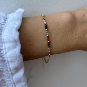 Pulsera motivadora. Selenita, granate, apatita, cornalina, ojo de tigre y cuarzo transparente. Chapado en oro/plata de ley.
