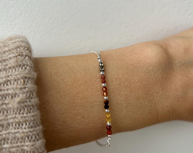 Bracelet for abundance and  positivity. Gold stone, pyrite, garnet,citrine, red jasper. Gold filled, sterling, stainless steel