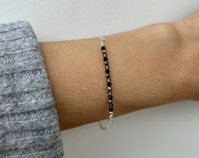 Gemstone bracelet. Protection, grounding, and personal empowerment. Black tourmaline, pyrite, smoky quartz . Gold, silver chain.