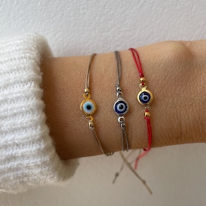 Evil eye cord bracelet. String bracelet. Protection bracelet. Adjustable bracelet.
