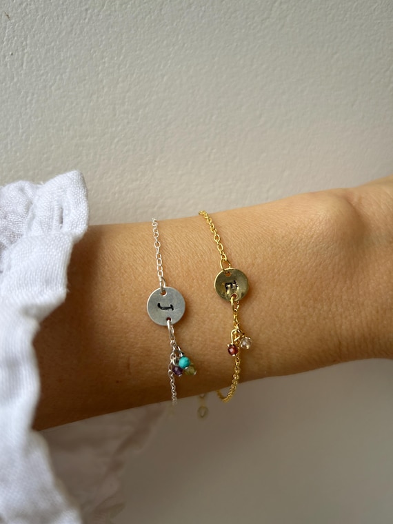 Personalised initial disc bracelet with family birthstones. Family birthstone bracelet with initial disc. Gold filled, sterling silver.
