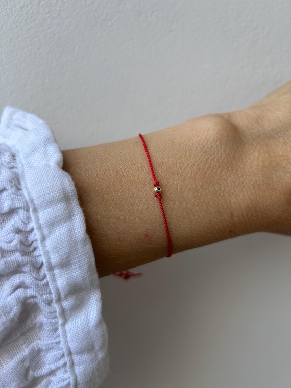 Red string bracelet with solid gold bead silk bracelet. 9k Solid gold bead red string bracelet . Silk cord bracelet (11 colours available)