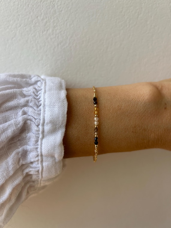 Black tourmaline, smoky quartz, clear quartz, citrine,  black sheen obsidian. Protection, grounding.  Gold filled, sterling silver