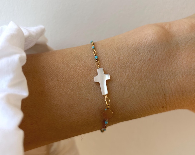 Sideways cross bracelet. Mother of pearl cross. Beaded stainless steel chain.