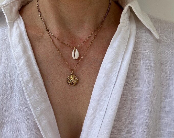 Sand dollar necklace. Stainless Steel cowrie shell Jewellery. Beach theme. Gold, silver. Waterproof.