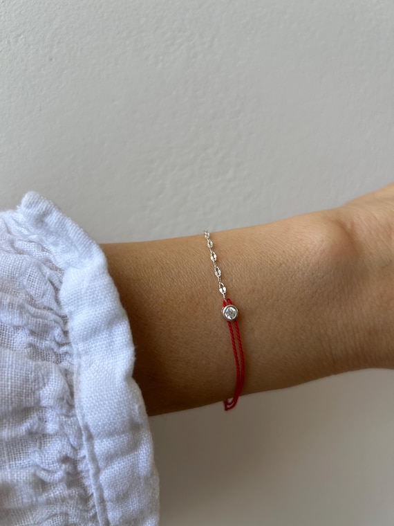 Red String of Fate Bracelet: Red silk and sterling silver protection bracelet.