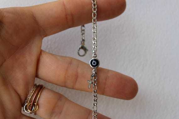 Mens evil eye and cross chain bracelet. Unisex evil eye bracelet. Protection bracelet. Silver/gold stainless steel Figaro chain.