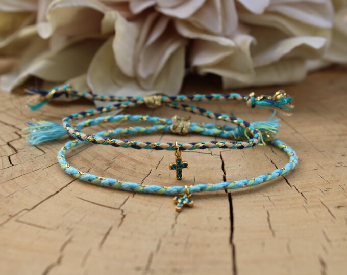 Tiny cross cord bracelet.  Friendship bracelet. Stainless steel charm. Adjustable.