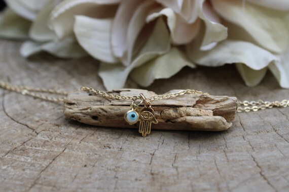 Hamsa necklace. Gold filled hamsa and evil eye necklace. Dainty hand of Fatima necklace. Evil eye necklace.