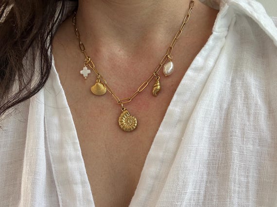 Multi charm statement necklace. Gold stainless steel paper clip necklace with charms. Stainless steel charm necklace. Beach theme.
