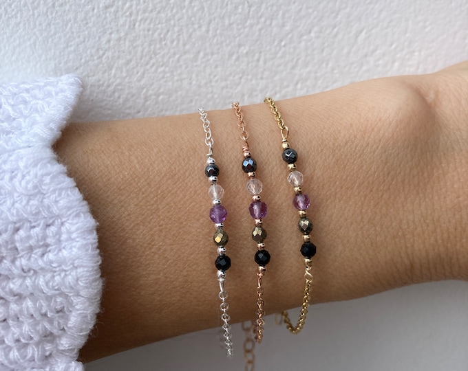 Empath protection bracelet. Black tourmaline, clear quartz, amethyst, pyrite and hematite.Gold, silver, rose gold.