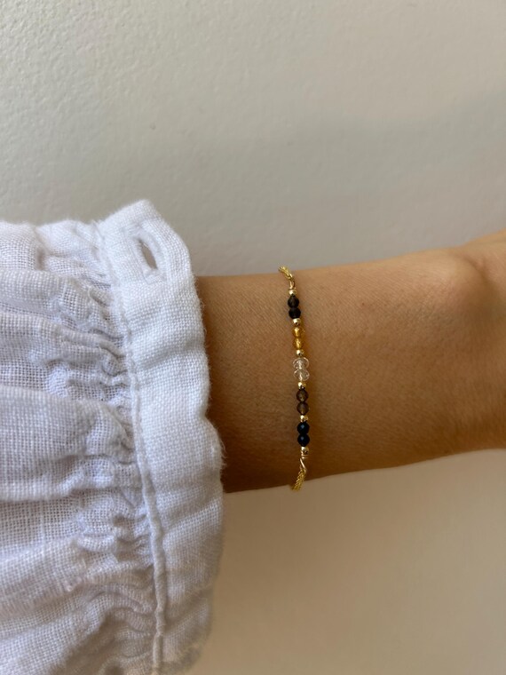 Black tourmaline, smoky quartz, clear quartz, citrine,  black sheen obsidian. Protection, grounding.  Gold filled, sterling silver