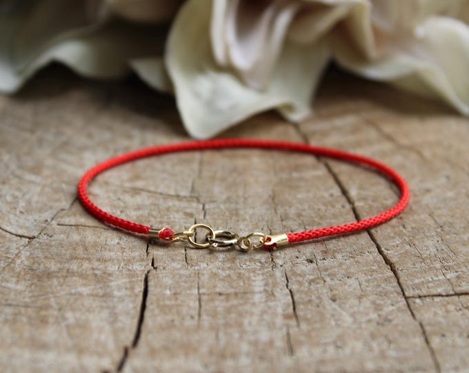 Red String of Fate Bracelet: Nylon Cord, Gold Filled/sterling silver clasp. Simple red string.